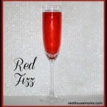 red fizz drink in champagne glass