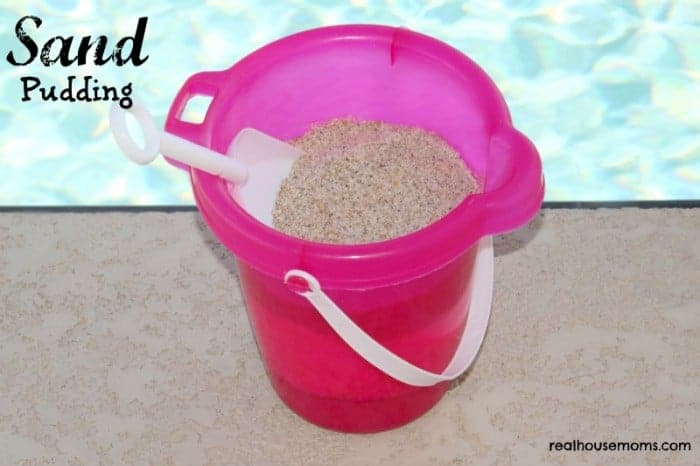 sand pudding in a pail with a sand shovel
