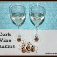 two drink flutes with cork wine charms