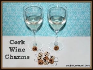 two drink flutes with cork wine charms