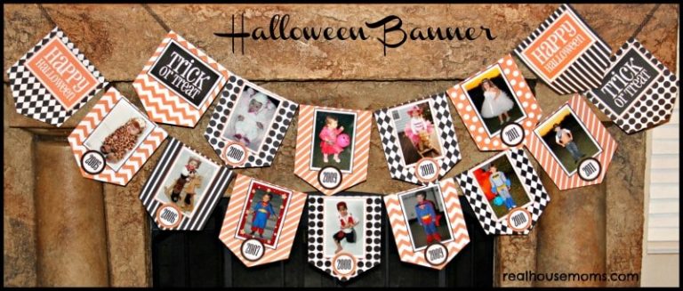 handmade halloween banner hung up on mantel