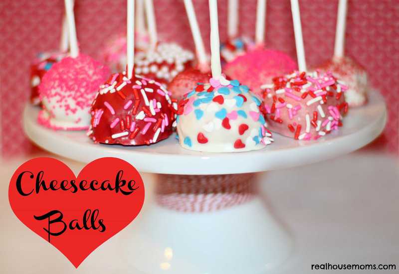 valentines themed cheesecake balls on a cakestand