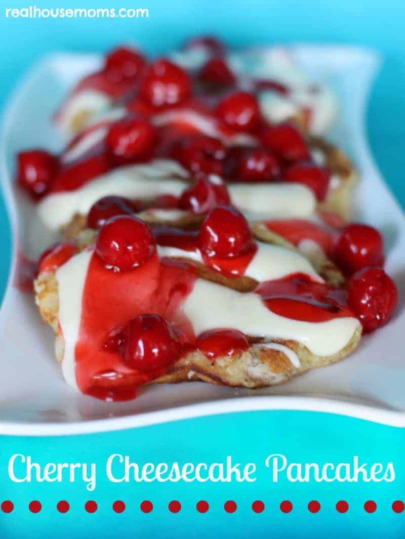 cherry cheesecake pancakes on a white plate