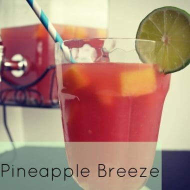 Pineapple Breeze cocktail with lime slice