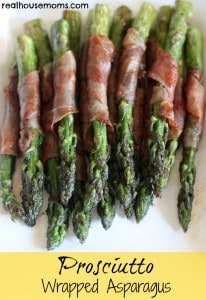 prosciutto wrapped asparagus on a plate