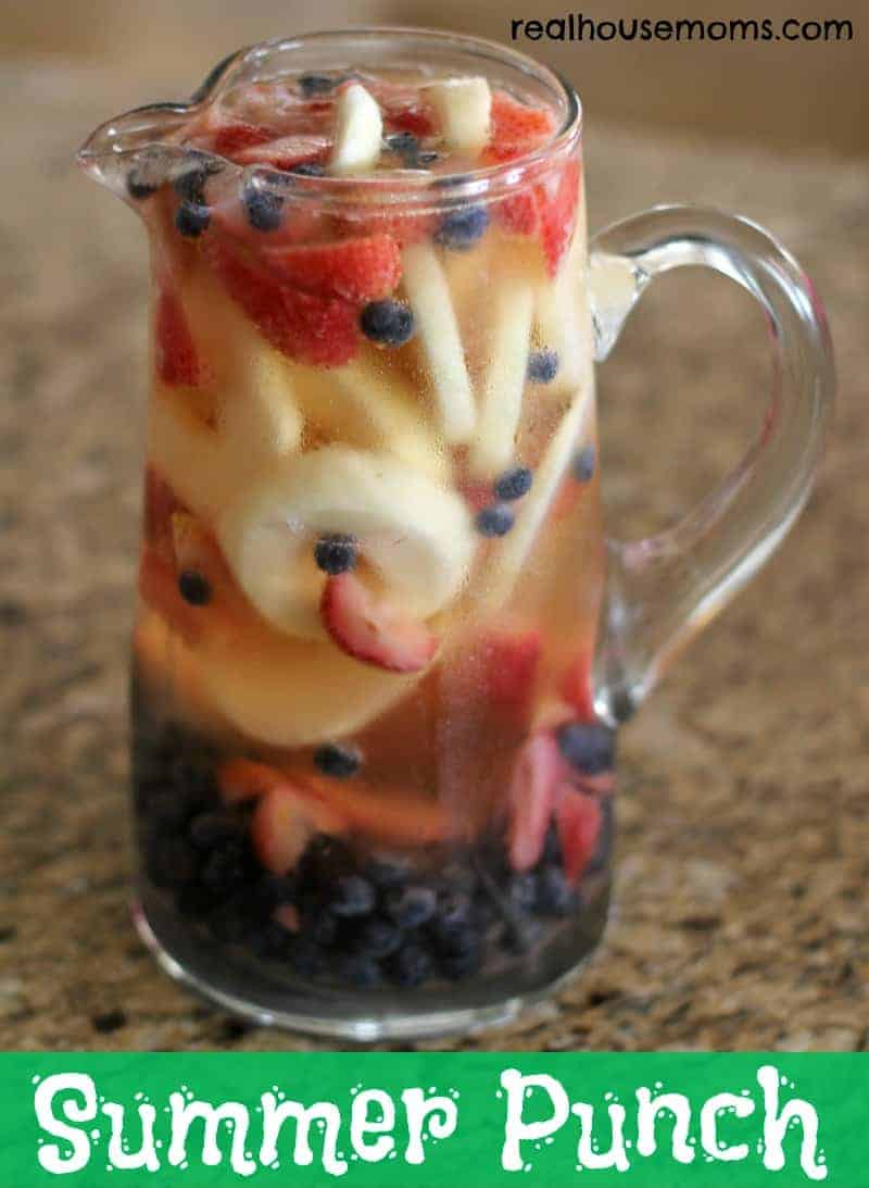 summer punch in a glass pitcher
