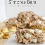 Reese's peanut butter cut s'mores bars on a wooden cutting board