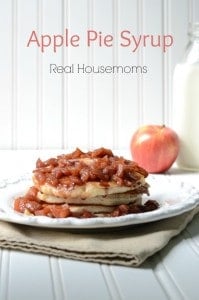 stack of pancakes topped with apple pie syrup