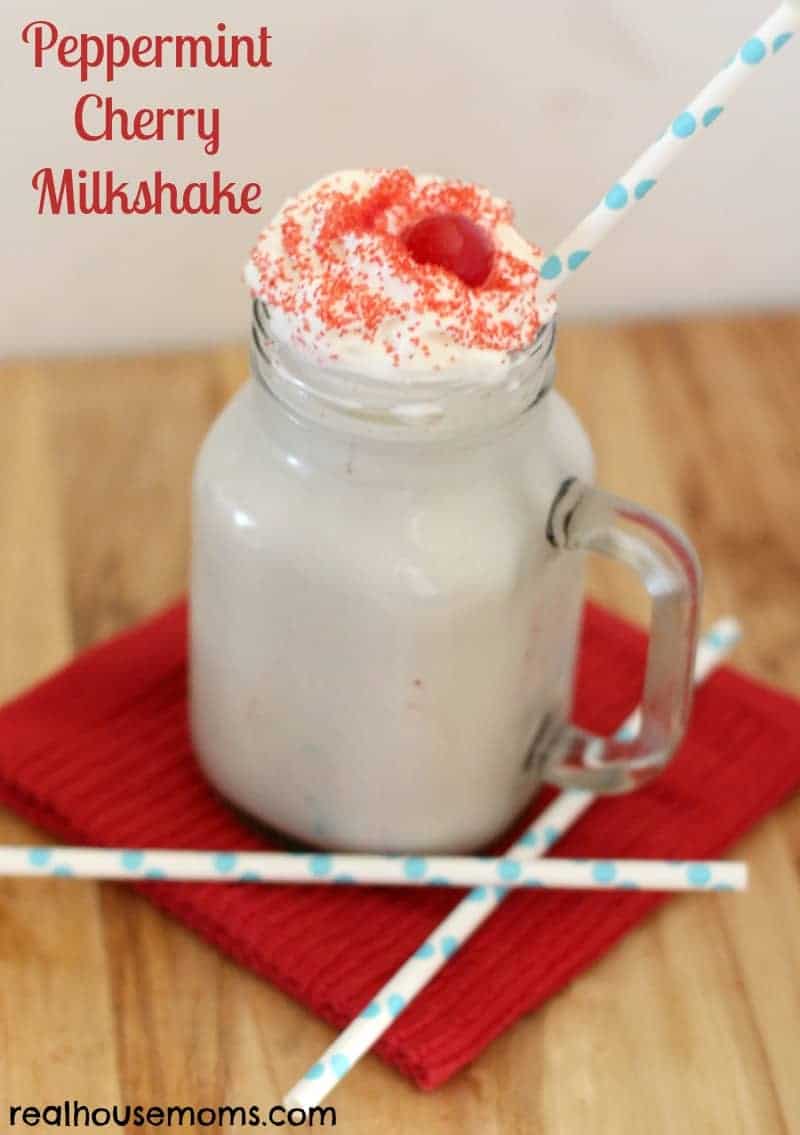 peppermint cherry milkshake in a mason mug