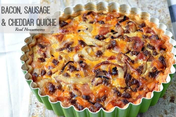 bacon sausage and cheddar quiche in a tart pan