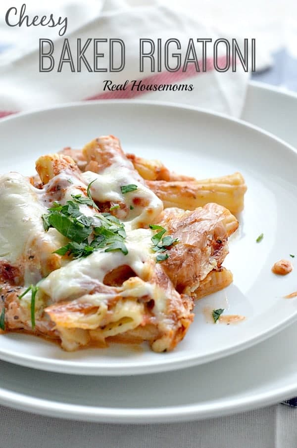 cheesy baked rigatoni on a white plate