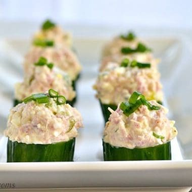 ham and egg salad cucumber cups on a serving platter