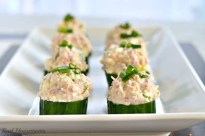 ham and egg salad cucumber cups on a serving platter