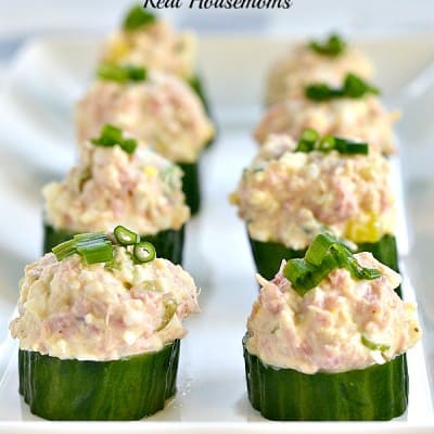 ham and egg salad cucumber cups on a serving platter