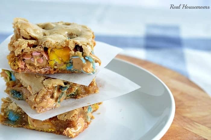 cookie bars stacked on a white plate