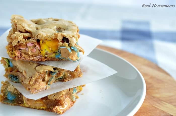 cookie bars stacked on a white plate