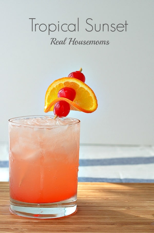 Tropical Sunset Cocktail | Real Housemoms | #cocktail #tropical