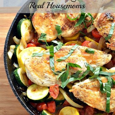 one pan chicken and vegetables in a cast iron skillet