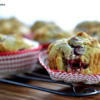 raspberry muffins on a baking rack