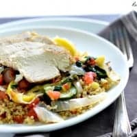 Chicken and Vegetable Quinoa Bowl topped with chicken