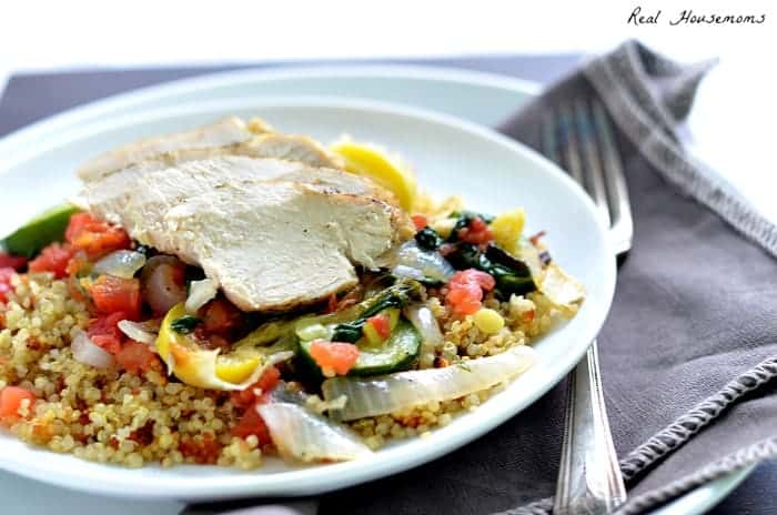 Chicken and Vegetable Quinoa Bowl topped with chicken