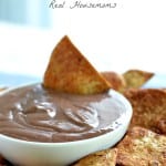 mexican chocolate cannoli dip in a bowl served with cinnamon sugar chips