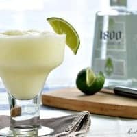 pina-rita cocktail served with lime wedge