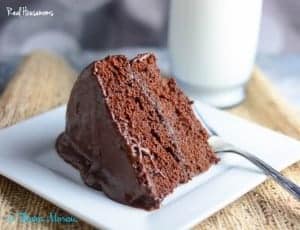 slice of Chocolate layer cake on a white plate