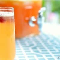 Sparkling Peach Punch in glass flute
