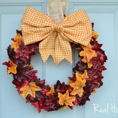 Fall Wreath leaves added to wreath with cute bow at the top
