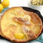 Dutch Baby Recipe topped with lemon served in a skillet