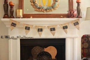Chalkboard welcome banner made of burlap with gold detailing and mini chalkboard
