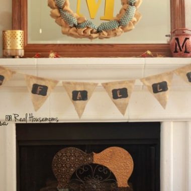 Chalkboard welcome banner made of burlap with gold detailing and mini chalkboard