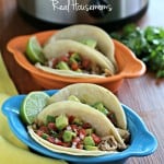 Slow Cooker Chicken Tacos served in two taco bowls