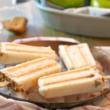 Apple Pie Popsicles, four sitting on a bed of ice