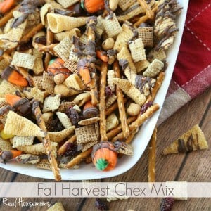 Fall Chex Mix, chex mix with added candy corn seved in a white baking dish