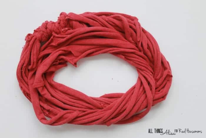 How to turn a T-Shirt into a scarf DIY T-Shirt scarf Red T-shirt cut into an infinity scarf