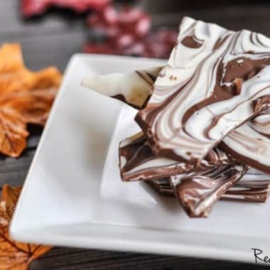 Tower of Chocolate Bark served on a white serving dish