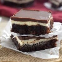 chai frosted brownies image shows a stack of two brownies on top of each other