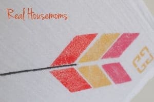 close up of diy painted bread cloth. Design is in the shape of an arrow