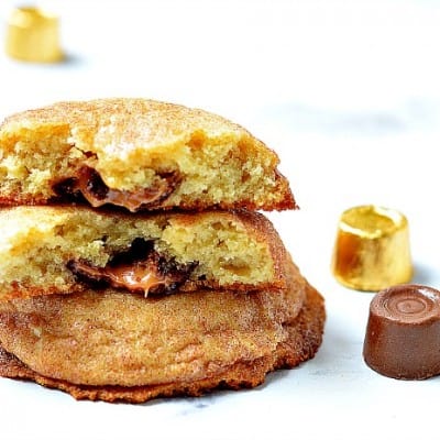 Rolo Filled Snickerdoodles are cinnamon sugar covered cookies filled with chocolate covered caramel Rolos.