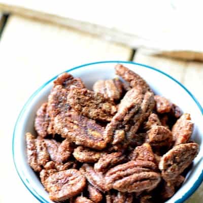 Sweet and Sriracha Pecans. Served in a blue and white bowl