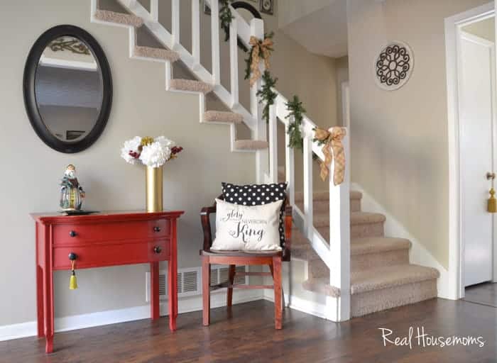 Thrifty Holiday Decor Inspiration. Gold vase with fake white, red and gold flowers