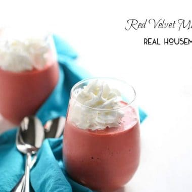 Red Velvet Milkshake. Red velvet cake mix is blended with chocolate and vanilla ice cream and chocolate milk. Red drink with whip crem on top served in a small stimless wine glass.