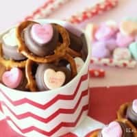 valentine pretzel bites. Pretzels topped with chocolate topped with Sweethearts. served in a festive valentine bucket