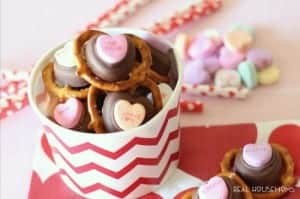 valentine pretzel bites. Pretzels topped with chocolate topped with Sweethearts. served in a festive valentine bucket