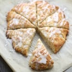 Lemon Macadamia Scones. Drizzled with white frosting cut into triangles