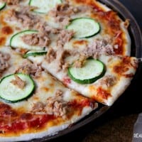 Tuna Zucchini Pizza. Pizza topped with Zucchini and Tuna.