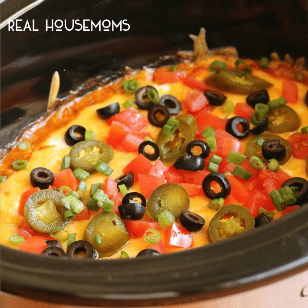 Slow Cooker 7-Layer Chili Cheese Dip.