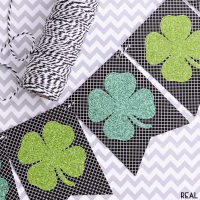 shamrock banner printable. black and white background with shamrocks on the front. Shamrocks are two different green colors